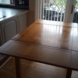 extendable solid Oak  natural wood dining table
90cm x 90cm 4 places
2 leaves can extend to 155cm long 6 places