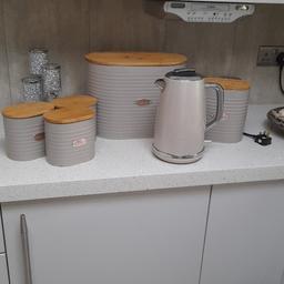 like new only used for 2 month as changed decor in kitchen. coffee tea sugar bread bin biscuit tin and kettle, all in a taupe colour, great condition pick up only.