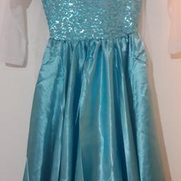 Beautiful Elsa frozen dress costume brand new. It has a beautiful long train at the back and long net sleeves. I have more of these available in similar if anyone interested.