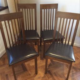 FOUR wooden dining chairs in very good condition from a smoke-free, pet-free home. 
Buyer to collect. £30.00 ono