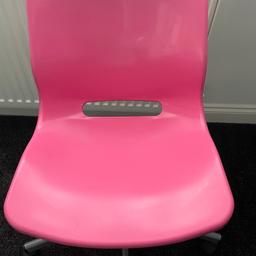 Pink plastic swivel chair on wheels / castors. 

Office or desk chair. 

Collection only from WV14 9HB