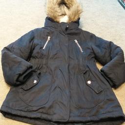 Girls navy blue winter coat age 7years from John Lewis. Lovely warm winter coat with fur lining to hood and upper half of coat. Used but still in very good condition. Size is age 7 but only allows me to list as 6-7 or 7-8years