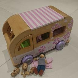 Wooden toy push along Camper Van from the EARLY LEARNING CENTRE.
2 front doors and 1 rear door all open. 
The striped roof panel is held on by magnets and can be lifted off to reveal the vans interior. 
includes 1 figure and 3 animal pets.. 
Curtains can be opened and closed but 1 curtain pole Is Missing.. could easily be replaced though... 
33cm long by 15cm wide and 29cm tall.
In great condition. 
collection only from postcode B60