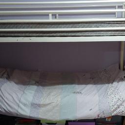 White Bunk Bed. Side ladder.
Very strong steel frame. Well loved, plenty of usage left in a good home.

Getting rid ASAP so quick sale required.
£35 or nearest offer.

Width: 97cm (38")
Height: 153cm (Just slightly over 5ft)
Length: 201cm (79")

(Underbed storage height: 25cm or 9.5" - Excellent to store things)