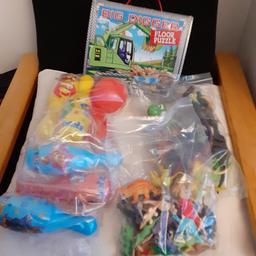 4 assorted toys . 
big digger 48 piece floor puzzle.
skittle game
2 bags of dinosaurs.
good condition can post for additional charge