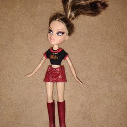 Bratz doll with skirt top and boots
not blue glitter on arm

please see my other items including Barbie, Chelsea and Steffi Love items
