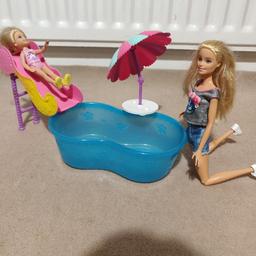 playset Including pool slide and sun shade parasol. 
please note dolls are not included
please see my other items