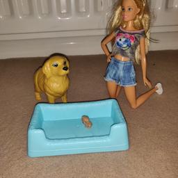 Barbie playset including dog that gives birth to a puppy and Barbie branded bed. 
please note doll is not included