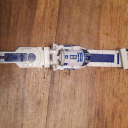 R2D2 watch from starwars in white and blue ,,,watch is working but im not sure how to change the time ,,