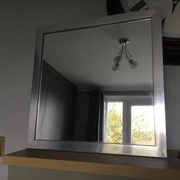 Mirror with silver frame. 45cm x 45cm. Collection only from OL4