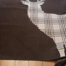 Dark Chocolate rug with a beige tartan pattern stag detail. In good used condition. 160cm x 230cm.
I do have a dog and cats but non smoking home.