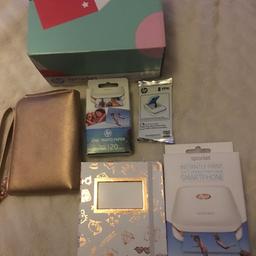 Hp sprocket printer gift set… includes white hp sprocket smartphone printer, wallet case, photo album and 2 packs of photo paper… ideal gift.. can deliver local