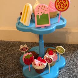 Toy cake stand in v good condition. From pet free and smoke free home.