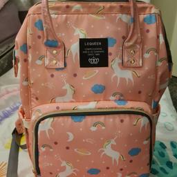 pink unicorn le Queen changing bag
loads of room/pockets for bottles
lots of zips/ pockets for storage and easier access

godsend of a bag
I don't use it anymore
practical brand new