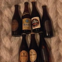 7 x Vintage miniature bottles of beer. Guinness and harp. Full and unopened. Comes from a smoke and pet free home. Collection only
