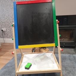 chalk and white board 
3 heights 
come with chalk and duster 
been played with but still a fab toy