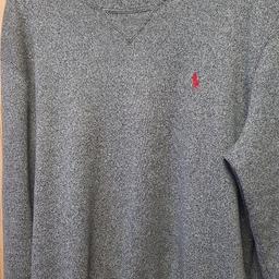 Genuine Ralph Lauren Polo Sweater Jumper 

Nice smooth and warm Knitwear 

Size Large 

Beautiful grey with black specs, perfect for smart look over winter.

In excellent clean condition

Grab a bargain! 

Cheers!
