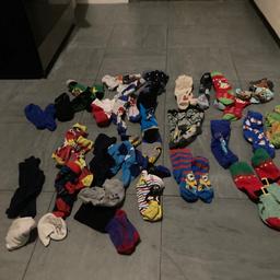 A range of socks from Batman, paw patrol, Christmas, minions and bing. Collection only. Shoe size for socks is 6-8.