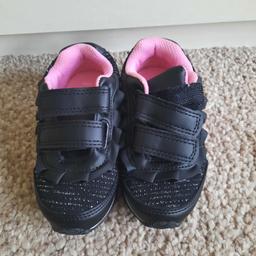 Brand new girls black trainers. size 7. Smoke and pet free home. Collection  only.