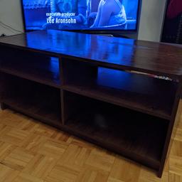 FREE - Walnut coloured large TV stand. Has two scratches but is in good condition and solid. Length - 103.5cm Width 50.5cm Height 46cm. Can deliver locally