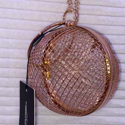 pretty little think gold caged sphere clutch bag,
labels are still on 
chain included