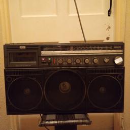 This is a lovely retro boombox by Phillips made in the beginning of the 1980's. It was made in the period of 1983-1984. It is well known model by Phillips, D8444 Power Player. The cassette player does Not work. But otherwise It is kept in a good vintage condition, with some small signs of use. It will be perfect for a project, with some small repairs it can be fully functional and working. It can be used for parts as well. It sells as is.
Dimensions: 540 X 330 X 140 mm and weight of 6.5 Kg.