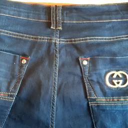 one pair of dark blue gucci jeans, size 34 slim fit been in wardrobe forgot they were there so like new