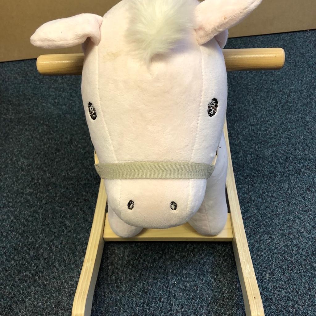 Lovely mamas and papas pink flower rocking horse. Great condition and outgrown by little one. Measures 70cm by 52cm. From smoke and pet free home. Ideal Christmas present. Collection only. Sale now £20