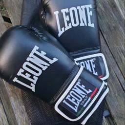 Selling New Leone 1947, 10oz, black boxing gloves! It is the perfect item for all those who decide to start playing ring sports. The perforated technical material on the palm and the PU flex layer padding allow greater ventilation of the hand and excellent protection during all training sessions.
Brand new in his original carrying bag!
Original price £39.99