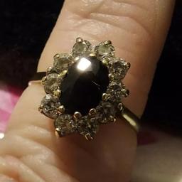 9ct Gold Ladies Dress Ring.
Very nice 1980's ring, very typical of the time.
One good size central spinel with 10 outer spinel's
Nice clean ring, slight bend to shank, hardly noticable, perfectly wearable NOT SCRAP......
Size L 1/2 - M
Weighs 2.25g