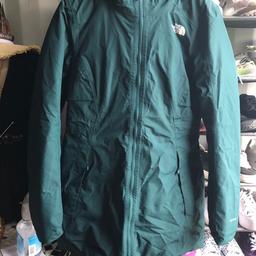 Dark green jacket with two front pockets and draw cord waist as new never worn size small £25 collection Elm Park
