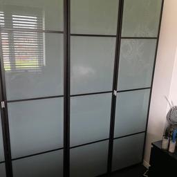 Frosted glass wardrobe doors with hinges from ikea in dark wood x4 single doors 201cm height. 
Pet and smoke free home.