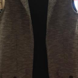 Waistcoat by Miss Selfridge. Colour grey. Size 10. Two side pockets. Buttoned shoulders. Hardly worn and in very good condition. Collection from Broadstairs CT10 2QQ. From a smoke and pet free home. Please feel free to ask if you have any questions