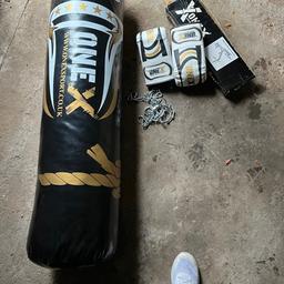 Boxing bag and gloves and bracket brand new just been opened and not used