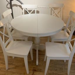 ikea dining table with 6 chairs
extending with easy mechanism and the middle stays in the table to store.
solid furniture with general wear and tear. the table has slight water damage to one side see pic  nothing major. 
smoke and pet free home
collection from se14/se8