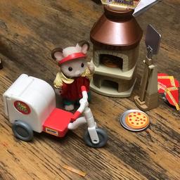 Sylvanian families pizza oven and pizza delivery scooter and driver. Comes from a smoke and pet free home. Collection only