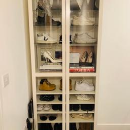 RRP £110.
Glass Soft closing doors.
Used to display and store shoes and books.
Can fit multiple pairs.
Can also be used as a book cupboard
Glass shelves which can be adjusted according to preferred height. Great for tall boots!

Contents not included

Collection only please :)