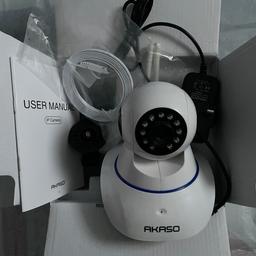 Akaso Wi-Fi indoor security camera. Reset and ready for new user. Easy set up via Wi-Fi and controlled using Yoosee mobile app. View and store clips using MicroSD card (sold separately). App motion alerts and notifications. Two-way audio and camera can tilt and pan.