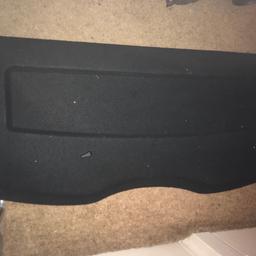 Used genuine Ford Fiesta parcel shelf luggage cover in black. In good condition. I believe it is for an 07 plate. Please check the number is correct prior to purchasing.
