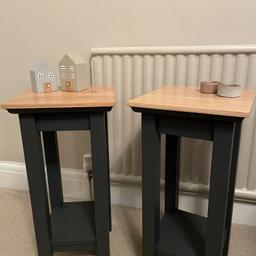 A pair of solid wood side/hall tables which have been newly painted using a dark grey by Frenchic.  The tops have been sanded then sealed for protection.
Measurements:- 30cm wide, 30cm deep and 59.5cm tall.