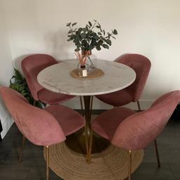 I can sell the table with pink velvet chairs for £350 or £250 for the table and £100 for 4 chairs.

90 diameter, height 75cm
In good used condition.
Features a gold leg with some scuffs
Collection only