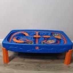 Step 2 hot wheels table, has a lid that covers the top so can be used as a table if wanted.
The lid has a few marks on from craft activities but is still fit for purpose.
Table was expensive and has been loved by my boy but he has now outgrown it.
