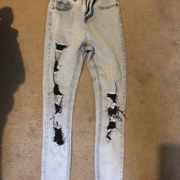 New look ripped jeans age 14 . Never worn . Collection only st Helen’s town centre area .