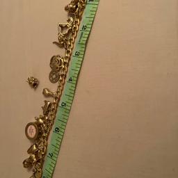 375 gold bracelets with 17 charms, all hallmarks with 375 9 ct gold. Please I am not a dealer so please can you not ask me for weight thank you.£6.75 first class if i can bother to post. But prefer collecting only.
