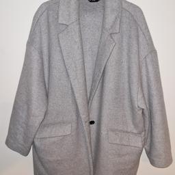grey coat size 22 in great condition comes with spare button.