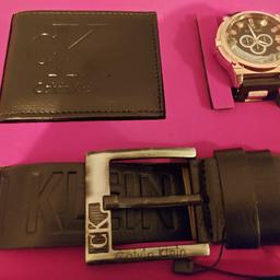 Unwanted Xmas gift. brand new in gift box. never been used. Watch is rose gold. leather belt and wallet. can deliver locally.