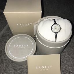 Brand new 100% genuine Radley watch. Stunning mother of pearl face with rose gold hour markers. Slider bracelet design to fit any wrist size. Comes in original box with, tag, certificate of authenticity and stopper on winder. Selling due to never wearing, I can post.