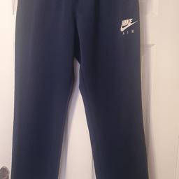 nike track bottoms with zip back pocket