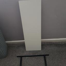 60cm by 20 cm. comes with wall bracket