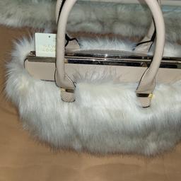 Brand new fluffy/furry bag in a lovely cream colour with beige accents.

All proceeds to local charity Manor Community Childcare Centre.

Collection from MCCC S2 1BE